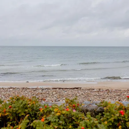 Enjoy The Sound Of Crashing Waves And Ocean Views
